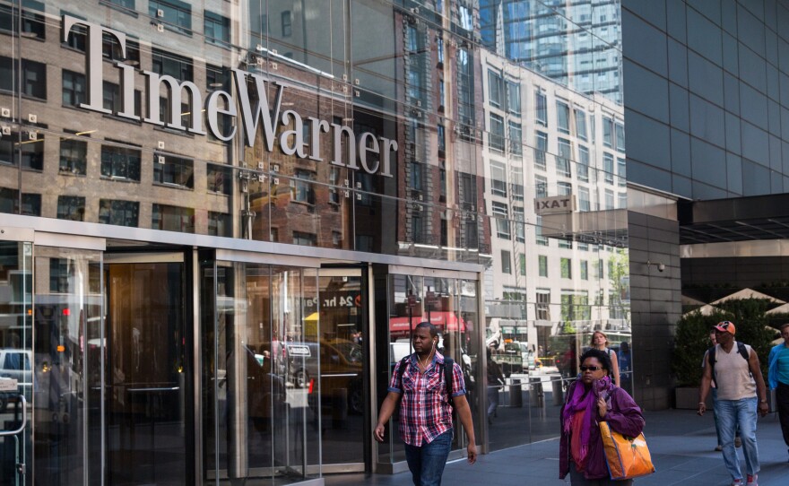 Time Warner is heading for another merger — this time with AT&T, in a deal that was announced Saturday. Here, the company's headquarters at New York City's Columbus Circle.