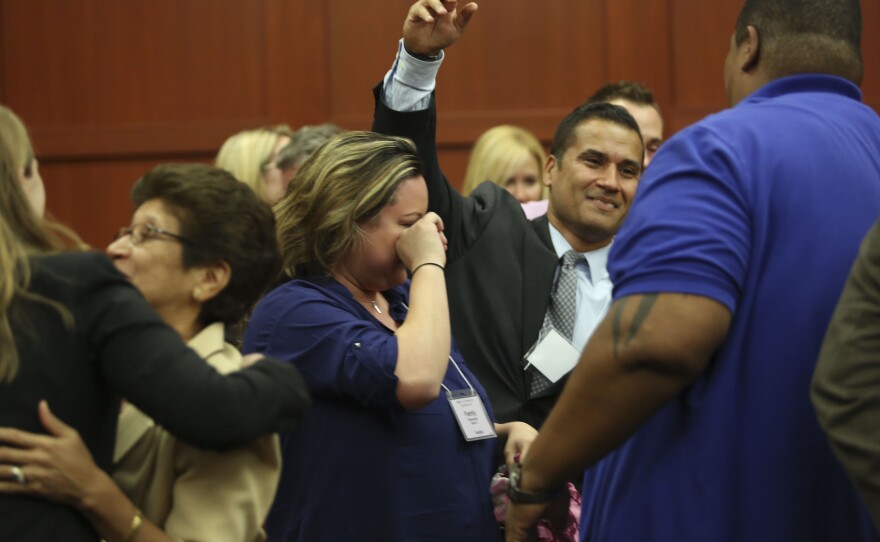 Zimmerman's family and friends celebrate after announcement of the acquittal.