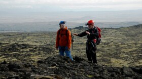 Frey and Sigrun surveying the volcanic landscape, Iceland.