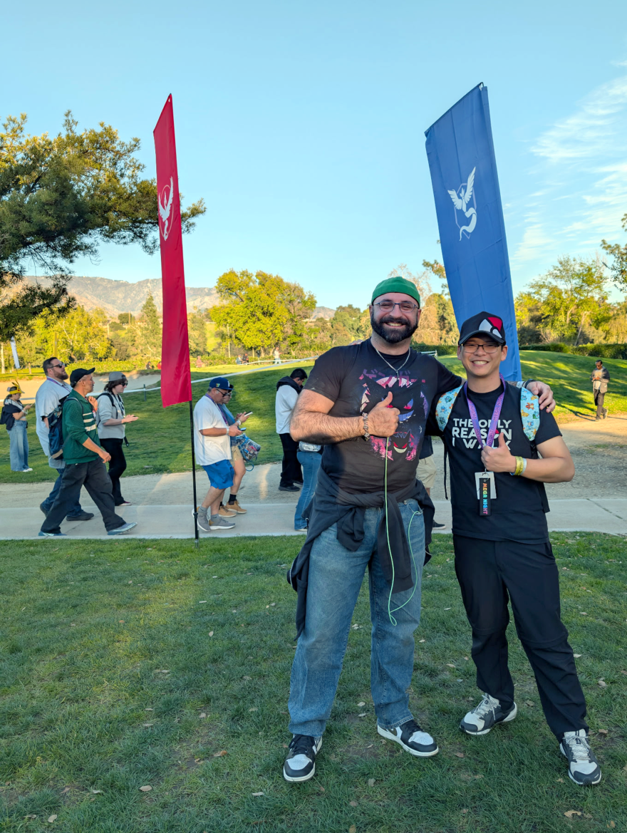 Oliver Soufi and Steven Chung participate in a Pokémon Go raid at Kit Carson Park in Escondido.