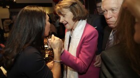U.S. Sen. Dianne Feinstein, center, greets supporters after speaking at an election night event in San Francisco, Tuesday, Nov. 6, 2018. 