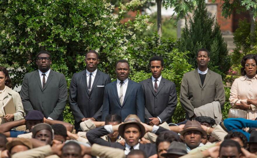 The film Selma stars David Oyelowo (center) as Martin Luther King, Jr., and focuses on several unsung activists in civil rights history. But critics say it distorts the role of President Lyndon B. Johnson and others.