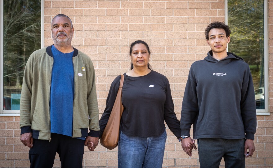 James and Sharon Smith, along with their son James Smith, vote on March 3 in Charlotte, N.C. in the state's primary election.