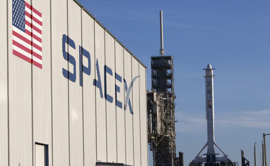 A SpaceX Falcon 9 rocket and Dragon spacecraft await liftoff from NASA Kennedy Space Center's Launch Complex 39A in Cape Canaveral, Fla., in August.