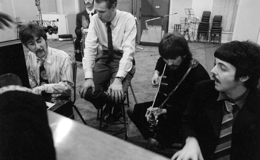 George Martin and The Beatles.