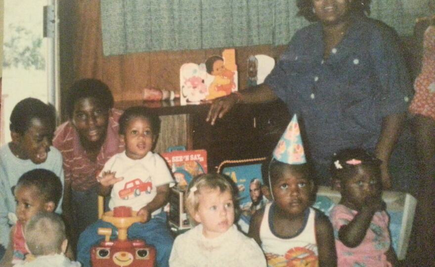 Undated photo of Rajah Gainey and his adoptive family. Photo courtesy of Walden Family Services.