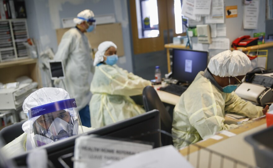 Emergency room doctors and nurses work on Monday at St. Joseph's Hospital in Yonkers, N.Y. New York has seen the most coronavirus-related deaths of any state.