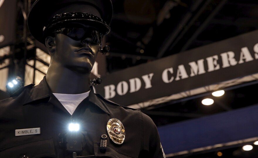 Police body cameras are seen on a mannequin at an exhibit booth by manufacturer Wolfcom at the International Association of Chiefs of Police conference in Chicago, on Oct. 26.
