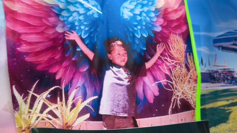 Hudson O'Loughlin outstretches his arms in a photo displayed at his memorial in Pacific Beach on Jan. 21, 2026.