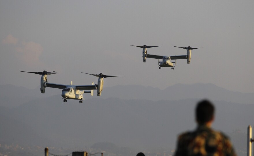 US Air Force V-22 Osprey aircrafts arrive at the Tribhuvan International airport in Kathmandu, Nepal, on Sunday. Runway damage forced Nepalese authorities to close the main airport Sunday to large aircraft delivering aid to millions of people following the massive earthquake.