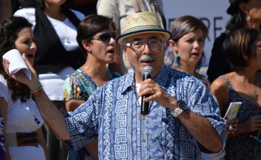 Juan Felipe Herrera speaks at the California Unity Poem Fiesta, a 2014 gathering thrown in celebration of his two years (at that point) as the state's poet laureate.