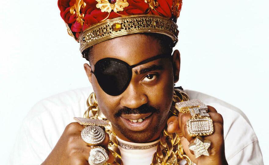 Slick Rick is known for his eyepatch and the crowns he often wears.