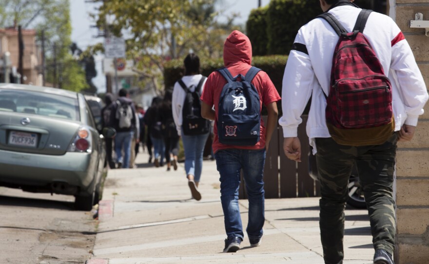 Students are shown leaving the Hoover High School campus on May 31, 2018. 