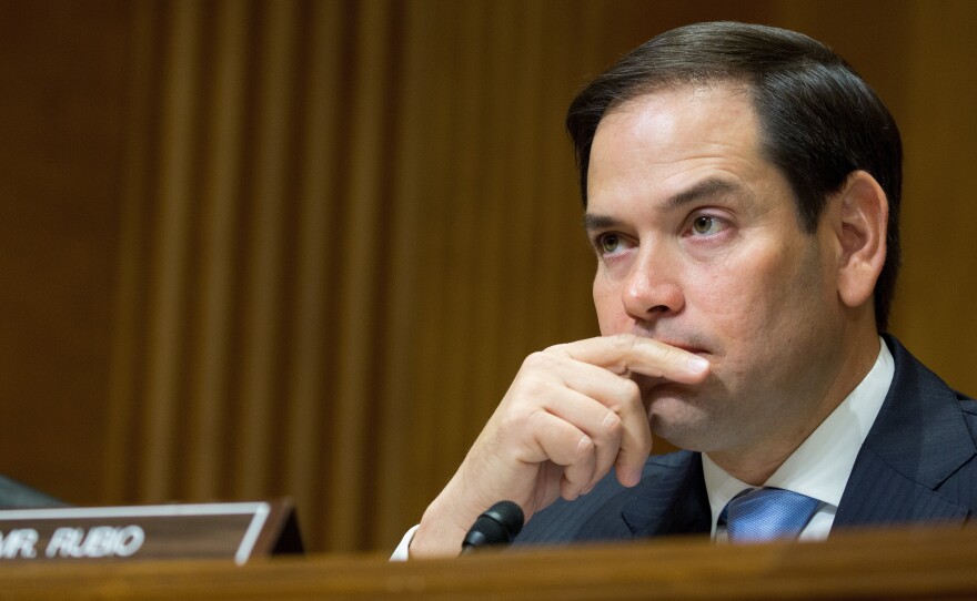 Florida Republican Sen. Marco Rubio, shown in July, had threatened a "no" vote on the bill because he wanted a more generous child tax credit for working families. He said Friday he will vote for the measure.