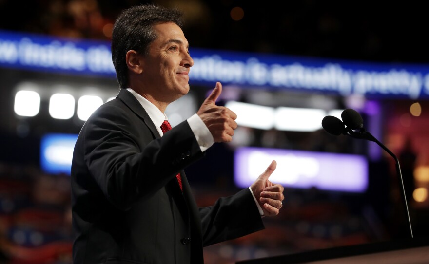 Scott Baio gives two thumbs up during his speech on the first day of the Republican National Convention on Monday at the Quicken Loans Arena in Cleveland.