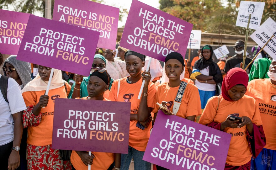 The debate over FGM has divided The Gambia for months, with hundreds gathering to protest outside parliament. Here, anti-FGM protestors demonstrate at the National Assembly session on March 18.