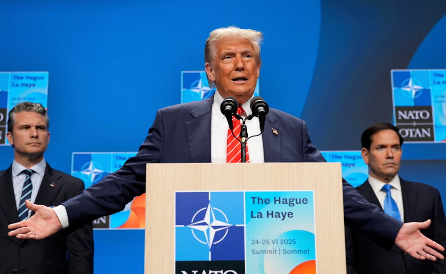 President Donald Trump speaks during a media conference at the end of the NATO summit as Secretary of State Marco Rubio, right, and Defense Secretary Pete Hegseth listen in The Hague, Netherlands, June 25, 2025.