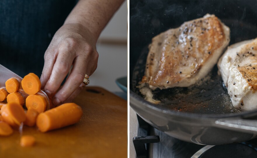 Adeena Sussman chops carrots and cooks chicken for her soup recipe.