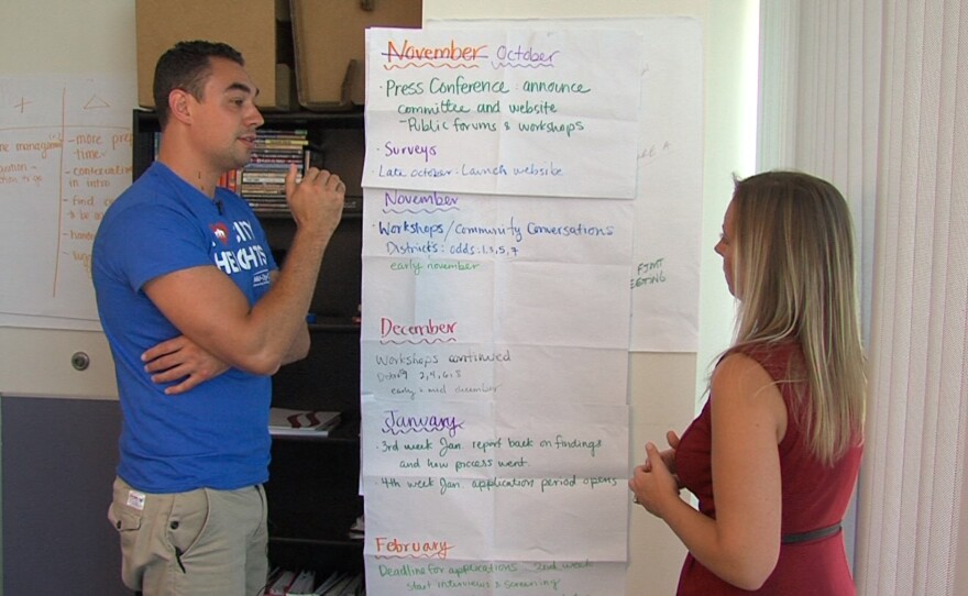 Mid City CAN's Sean Elo discusses with KPBS City Heights Reporter Tarryn Mento the youth council's draft proposed timeline for the city's national police chief search, Aug. 30, 2017.