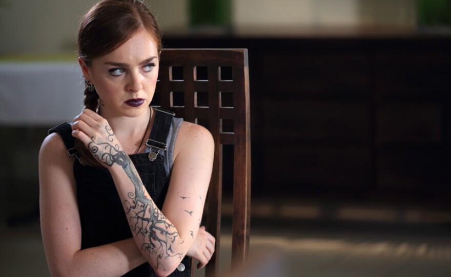 Kim (Louisa Connolly-Burnham) in a scene from episode 6 of DEATH IN PARADISE.