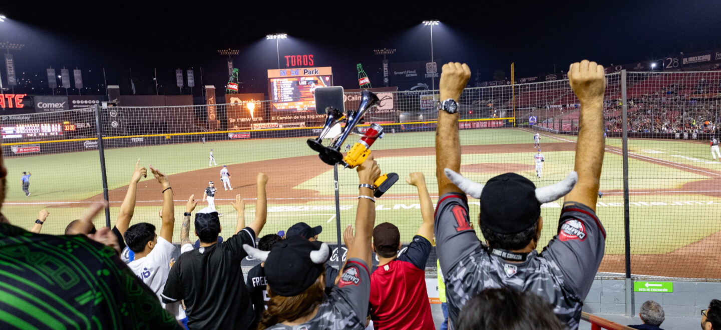 Fans cheer on the Tijuana Toros during a night game at the Mobil de Toros stadium in Tijuana, Mexico on July 31, 2026.
