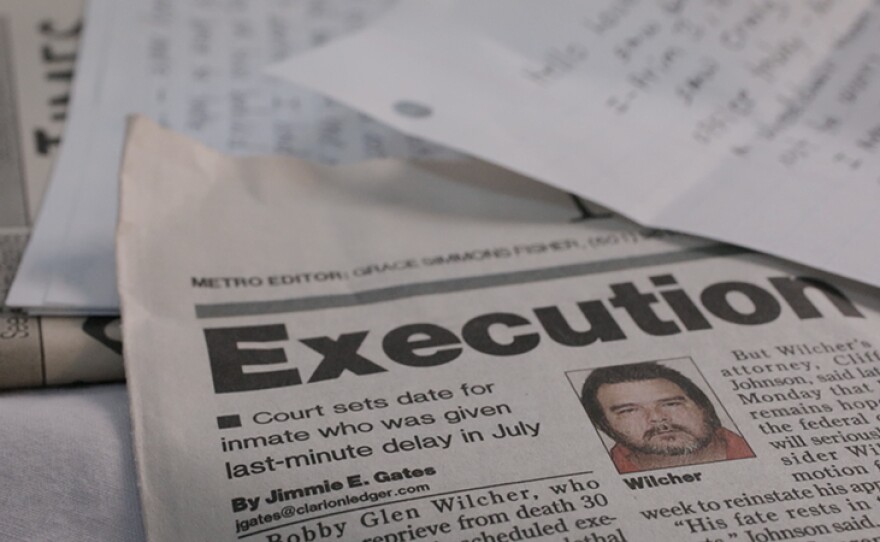 Newspaper with lead story about Bobby Wilcher's case that reads "Execution."