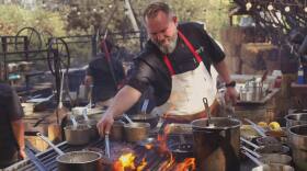 Chef Drew Deckman cooks over a wood-fired grill at his restaurant in Valle de Guadalupe in 2020.  