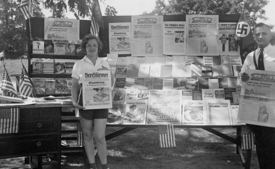Girl at a Nazi Propaganda stand, Camp Siegfried, Yaphank, New York, September 1936.