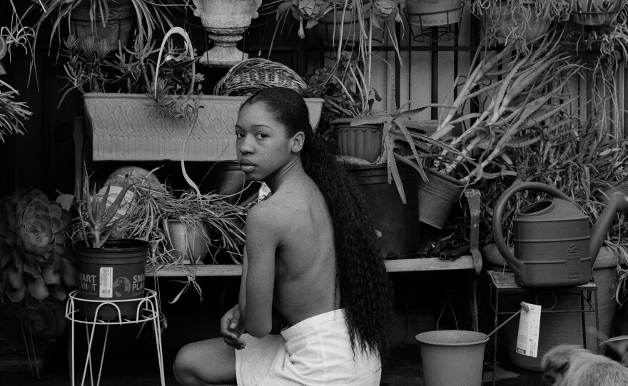 In "Potted Earth," a 2019 portrait in Los Angeles, Stone poses in her grandmother's backyard.
