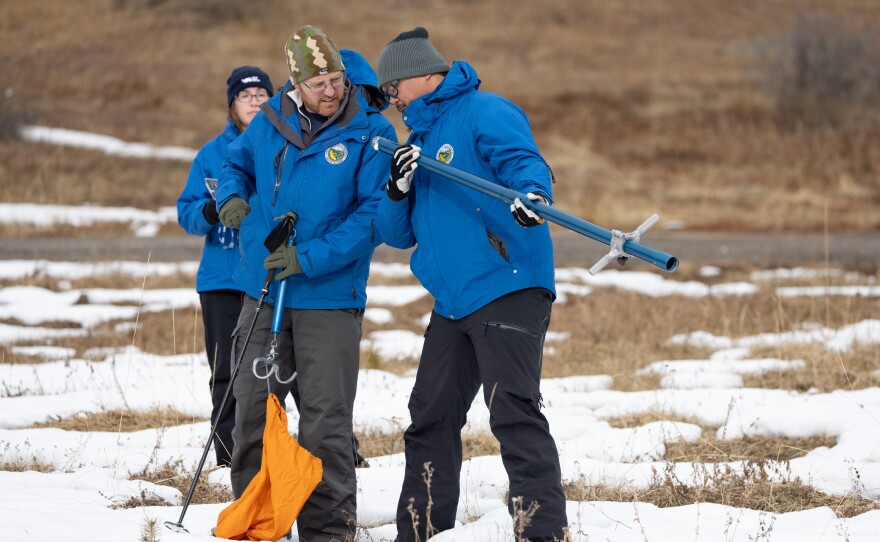 Right, Sean de Guzman, Manager of the California Department of Water Resources Snow Surveys and Water Supply Forecasting Unit, and Anthony Burdock, Water Resources Engineer in Snow Survey and Water Supply Forecast Unit, measure snowpack during the first media snow survey of the 2024 season at Phillips Station in the Sierra Nevada, Jan. 2, 2024.