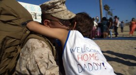 Marine Gunnery Sergeant Ramiro Gonzales is welcomed home by his son Alex after an 8 month deployment.