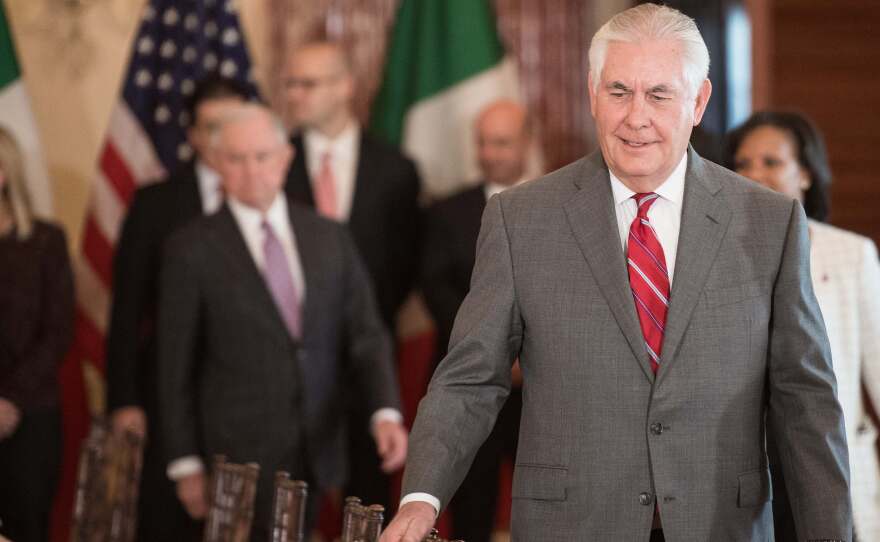 Secretary of State Rex Tillerson makes his way to his seat before the Strategic Dialogue on Disrupting Transnational Criminal Organizations at the State Department on Dec. 14.