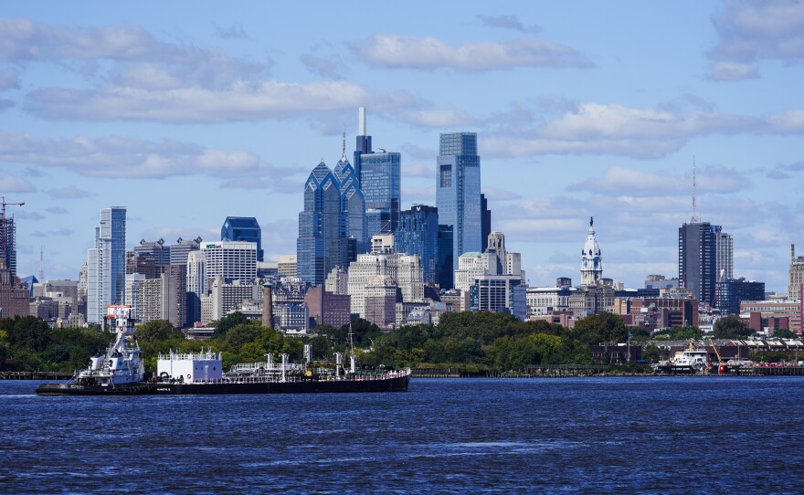 Philadelphia is seen across the Delaware River. Officials say the water is safe to drink — at least through Tuesday afternoon — after a latex finishing solution spilled into a Delaware River tributary late Friday.