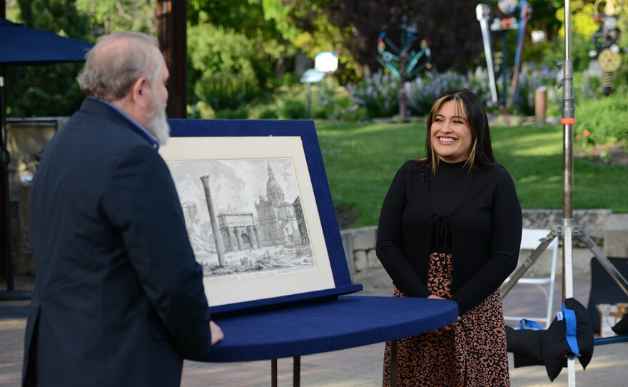 Craig Finner (left) appraises a Giovanni Battista Piranesi print, ca. 1800, in Boise, Idaho.