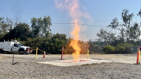 An ignited gas leak demonstration send flames high into the sky at SDG&amp;E’s Skills Training Center, Aug. 11, 2025.
