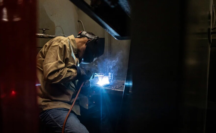 Student Felix Nevarez welds a piece of metal during a welding class at the Industrial Technology Building at Reedley College on Sept. 11, 2024.
