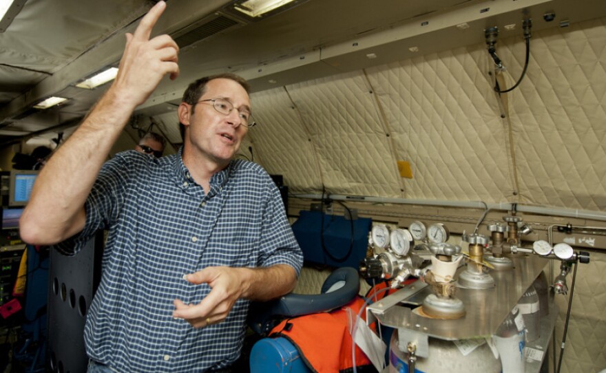 James Crawford, principal investigator of the DISCOVER-AQ project, aboard the P-3B at Baltimore/Washington International Airport on June 28, 2011. The aircraft is part of a month-long field campaign designed to improve satellite measurements of air pollution.