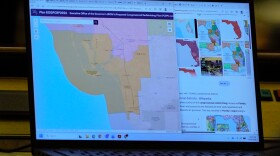 A senator's laptop displays a Congressional Redistricting Plan during debate before its passage in the Florida Senate.