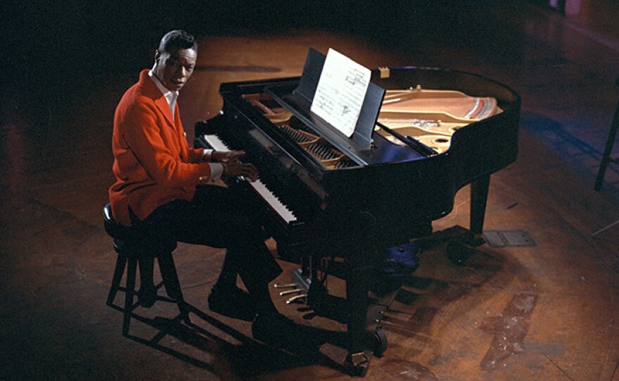 The legendary singer (seen sitting at a piano on stage) is celebrated on his centennial with vintage television performances of his classic hits in "Nat King Cole's Greatest Songs" (MY MUSIC) on PBS.