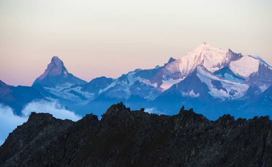 The Matterhorn mountain (left in distance) after sunrise seen from the Eggishorn mountain, in Fiesch, Switzerland, last month.