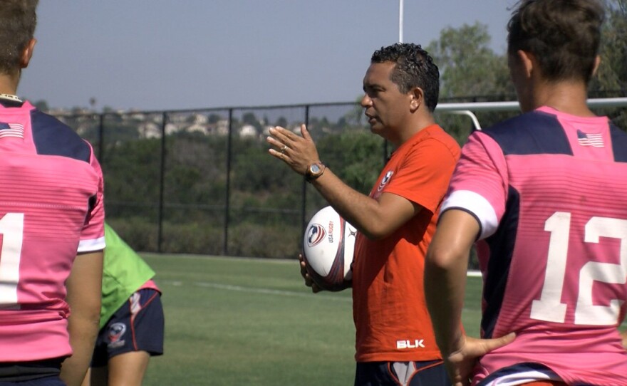 Women's rugby coach Richie Walker talks to his team during practice at the Olympic Training Center in Chula Vista, July 8, 2016.