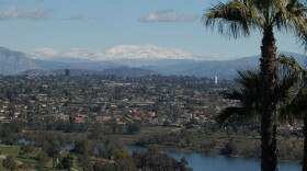 Snow covered mountains are seen from a Del Cerro neighborhood in San Diego, California on Sunday, February 27, 2011