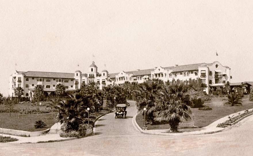 The Beverly Hills Hotel as it looked when it opened in 1912. The bleak landscape would eventually be replaced by lush tropical foliage, and after the depression, the white Spanish Mission-style hotel would be painted its now-famous pink.