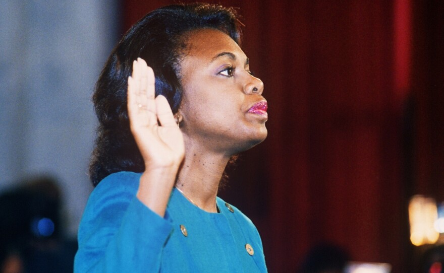 Law professor Anita Hill takes oath on Oct. 12 1991, before the Senate Judiciary Committee in Washington, D.C. Hill accused Clarence Thomas of sexual harassment.