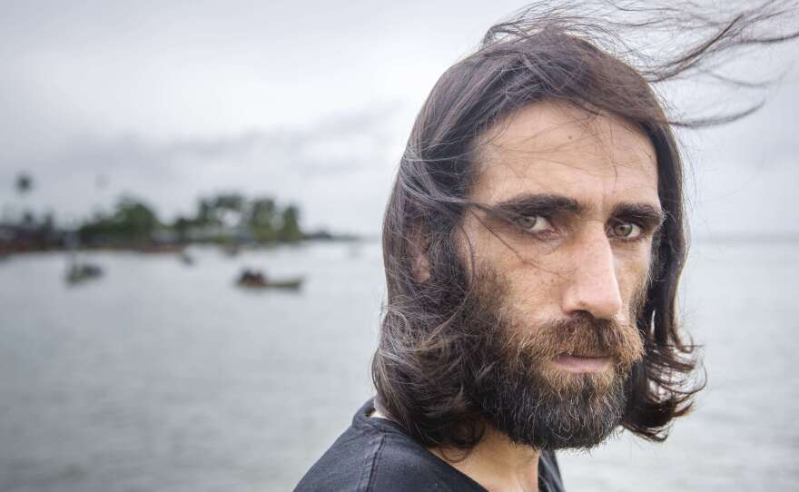 Behrouz Boochani, seen last year at the Australian detention center on Manus Island, Papua New Guinea, where the Kurdish-Iranian asylum-seeker spent years seeking his freedom. On Thursday, the prize-winning author touched down in New Zealand on his way to a literary festival — free for the first time in six years.