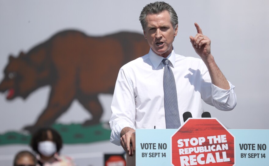 California Gov. Gavin Newsom speaks during a No on the Recall campaign event with Vice President Harris on Wednesday in San Leandro, Calif. President Biden is set to campaign with Newsom on Monday.