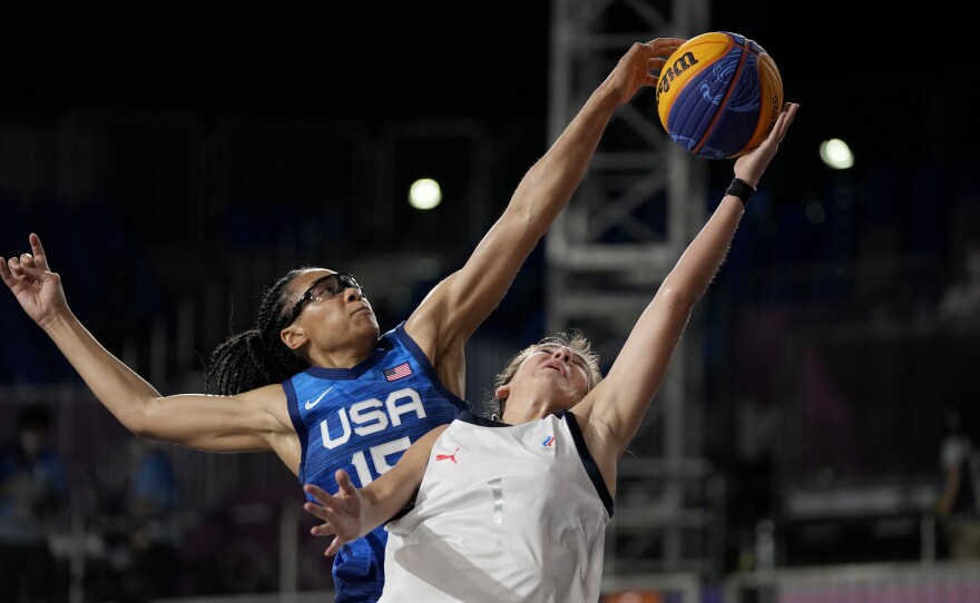 U.S. player Allisha Gray blocks a shot by Yulia Kozik from Russia on Sunday during a women's 3-on-3 basketball game at the 2020 Summer Olympics in Tokyo.