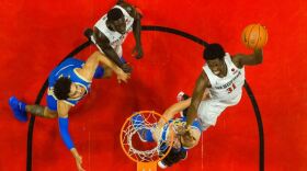 San Diego State's Nathan Mensah on a layup against No. 20 UCLA on Nov. 27, 2020