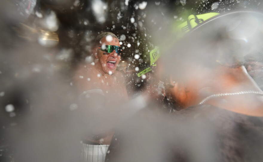 San Diego Padres third baseman Manny Machado celebrates with teammates after defeating the Chicago Cubs in Game 2 of the National League Wild Card baseball playoff series Wednesday, Sept. 30, 2026, in San Diego.