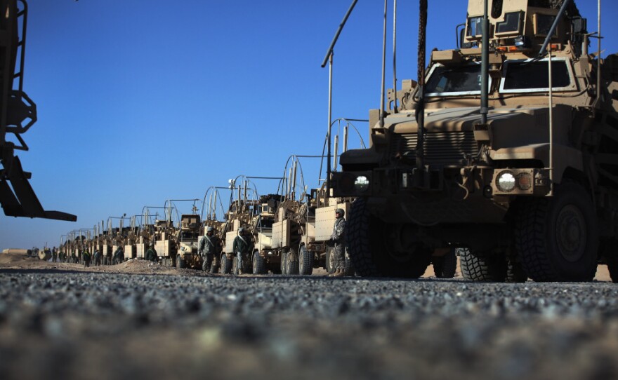 A day after leaving Iraq last week, U.S. Army soldiers from the 1st Cavalry Division lined up their armored vehicles near Kuwait City, Kuwait. Armored equipment will not stay behind after troops leave Iraq, but other property may.